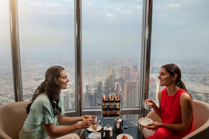 Experience breathtaking views from the highest outdoor observation deck while enjoying delightful treats and good company all set against the iconic skyline of Dubai.